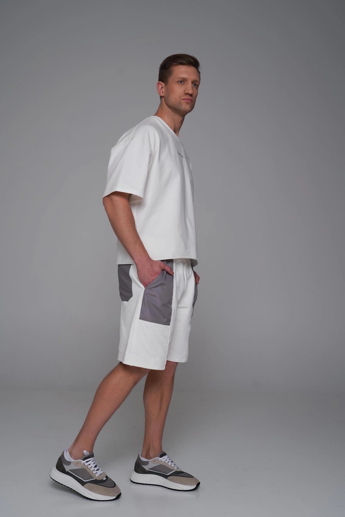 SAINT ISSA MEN’S CHAMPAGNE OVERSIZED SHORTS — CONTRAST PATCH PANELS
