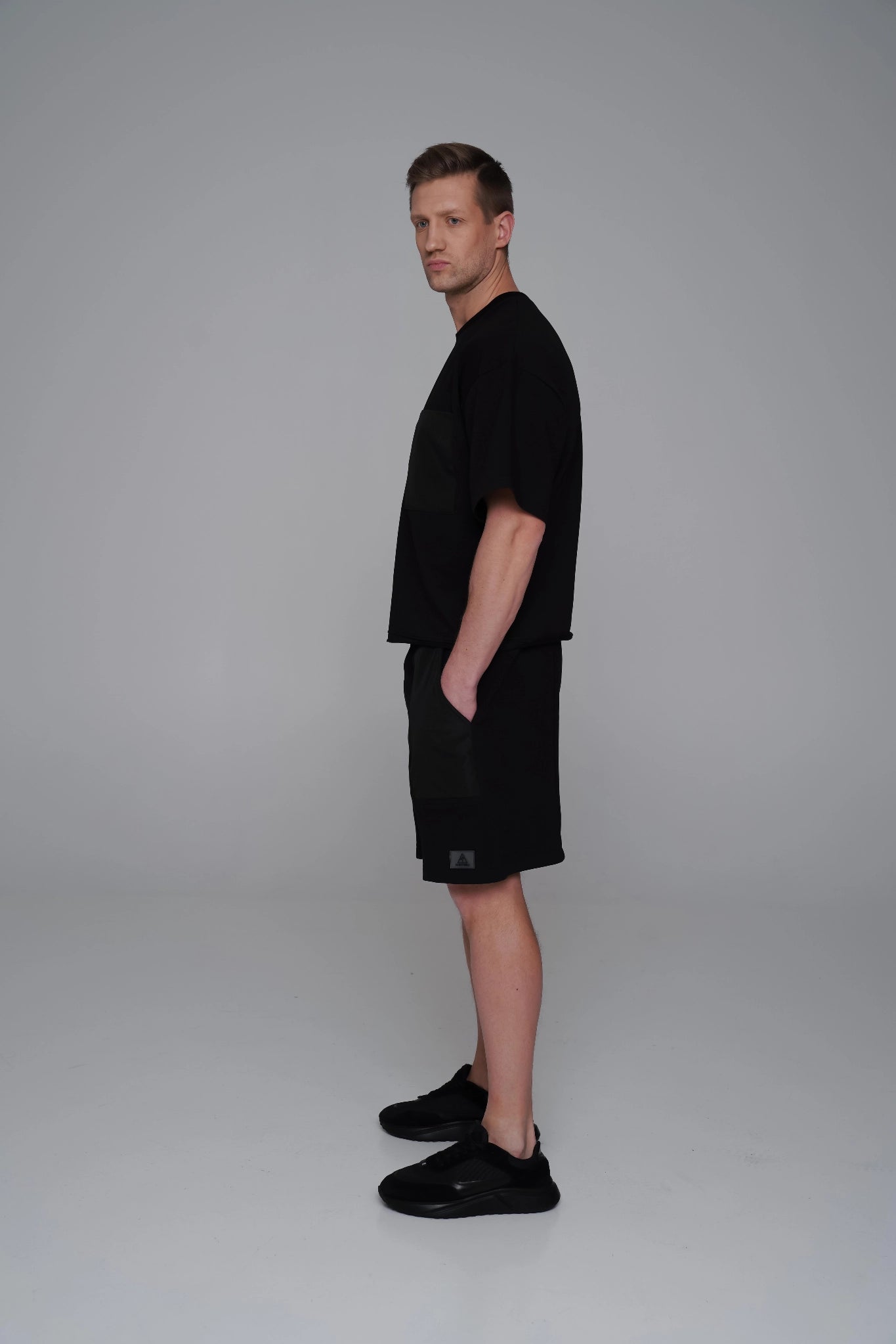 Saint Issa Men’s Black Oversized Shorts — Contrast Patch Panels