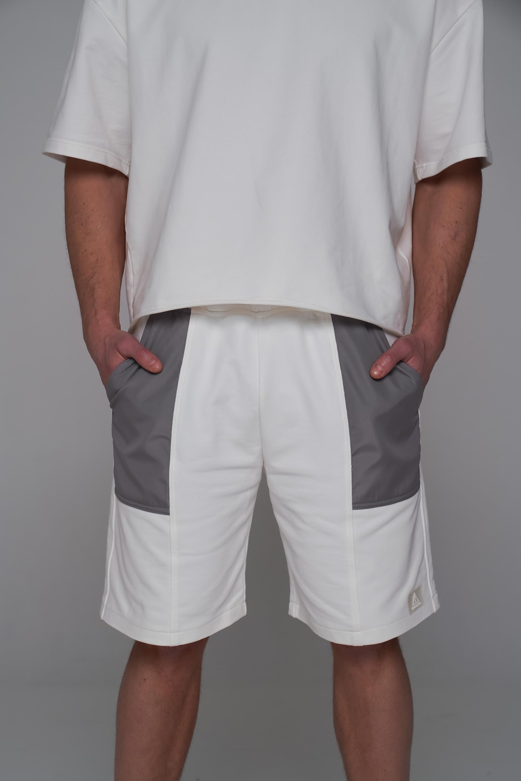 SAINT ISSA MEN’S CHAMPAGNE OVERSIZED SHORTS — CONTRAST PATCH PANELS